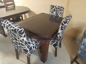 Compact 4-Seater Hardwood Dining Set With Geometric Accent Chairs