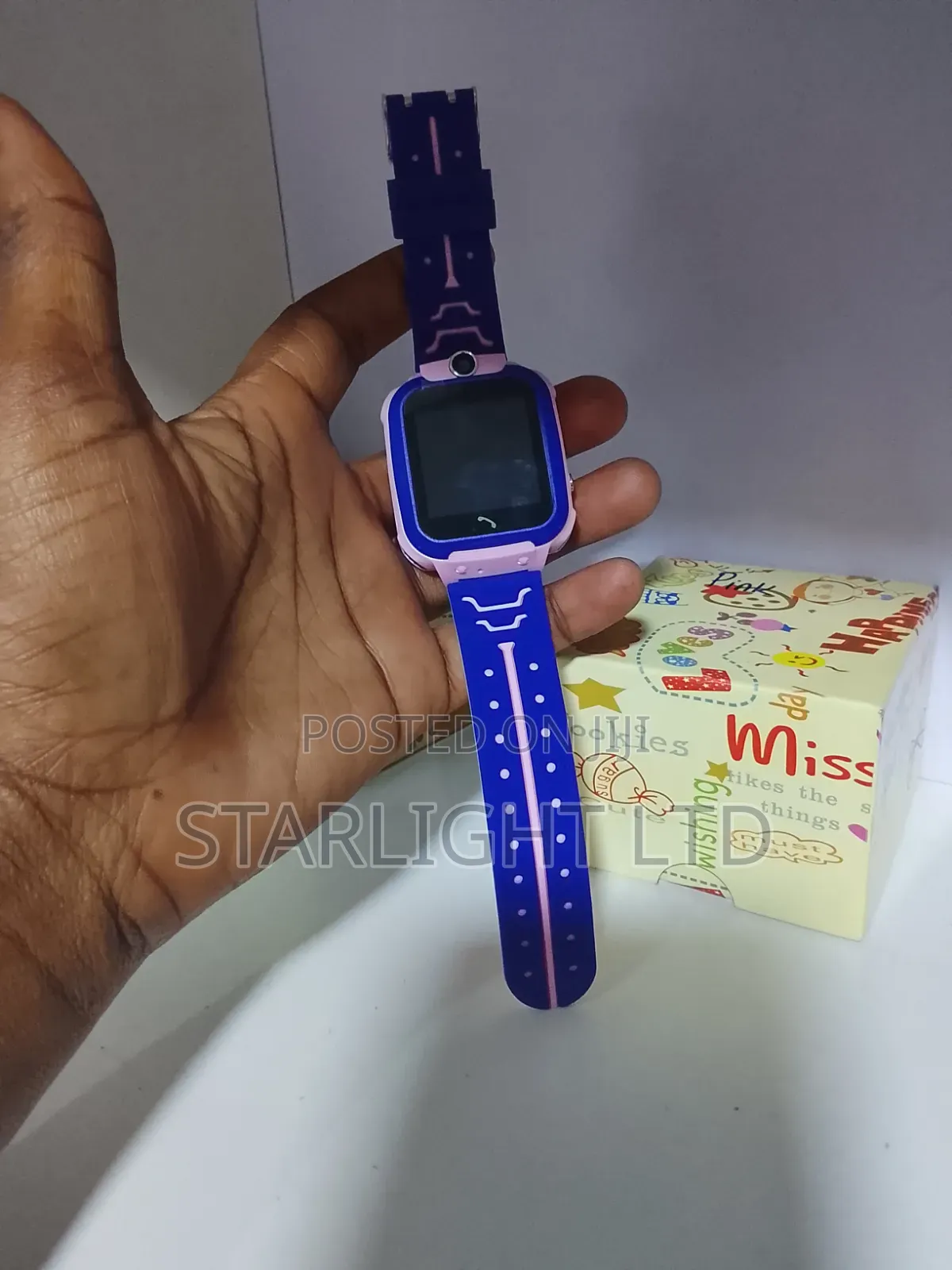 Vibrant Purple Kids Smartwatch and Novelty Display Packaging