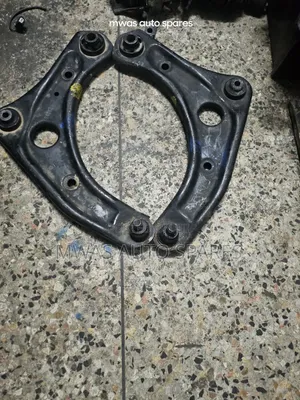 Nissnote E12 Control Arms