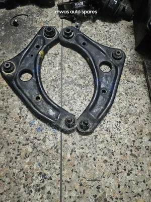 Nissnote E12 Control Arms