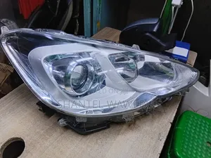 Aqua 2014 Headlight