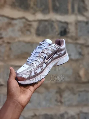 The Nike P-6000 the White/Purple Dynasty/Light Violet Ore
