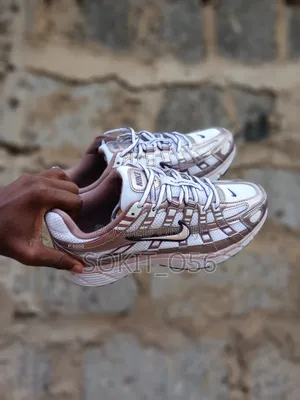 The Nike P-6000 the White/Purple Dynasty/Light Violet Ore