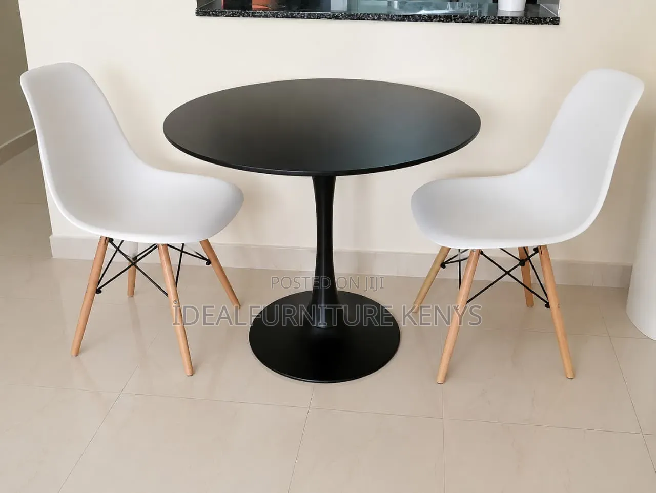 Black Round Table and White Eames