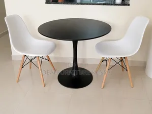 Black Round Table and White Eames