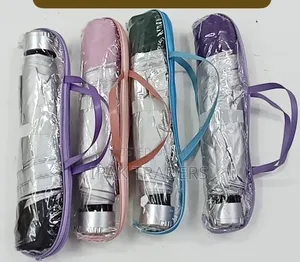 Foldable Capsule-Style Travel Umbrellas With Carrying Strap Brand-Able