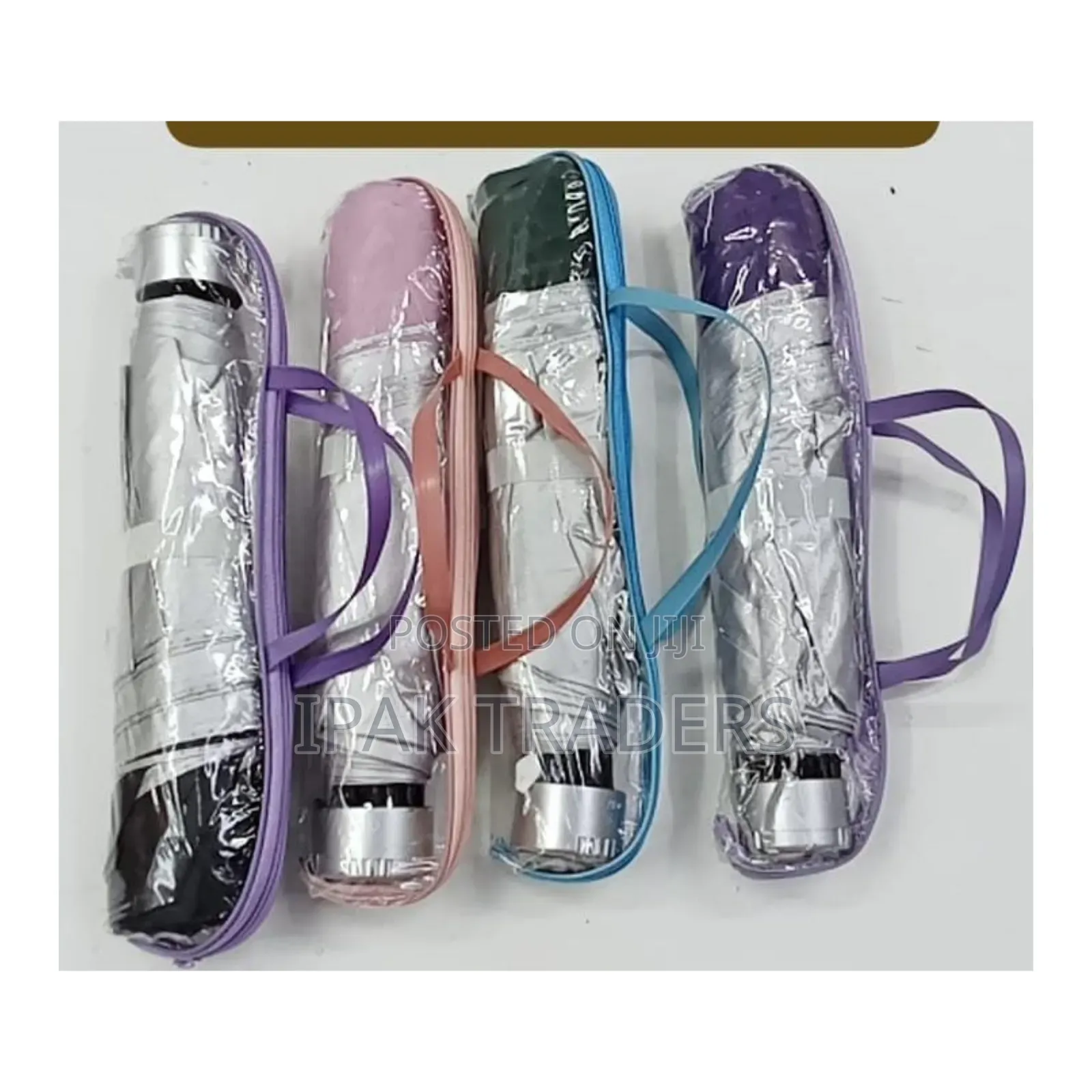 Foldable Capsule-Style Travel Umbrellas With Carrying Strap Brand-Able