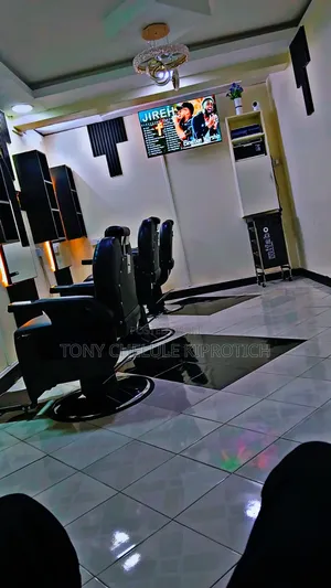 Massaging and Barbering at Imani Spa and Barbershop