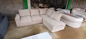 L Shaped Sofa With Back Pillows