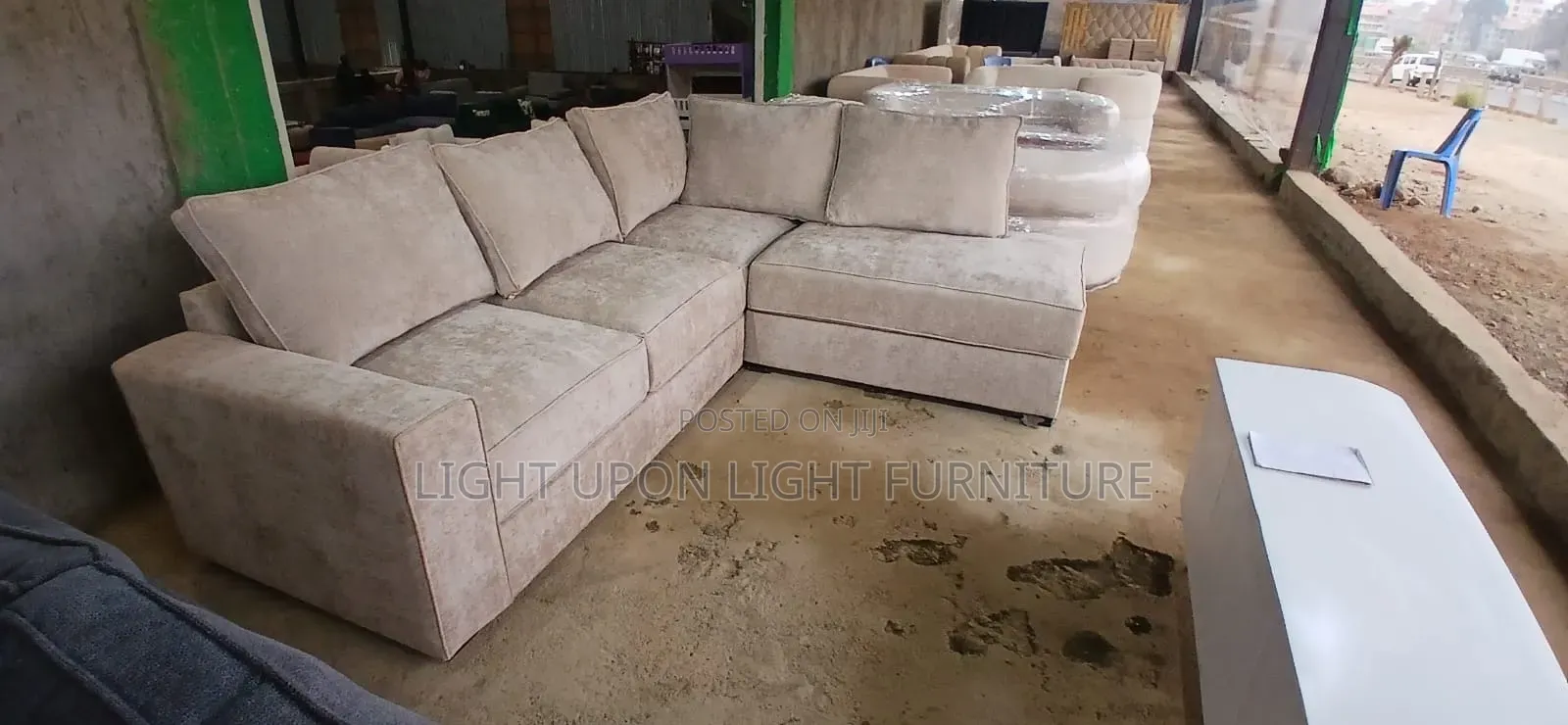 L Shaped Sofa With Back Pillows
