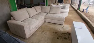 L Shaped Sofa With Back Pillows