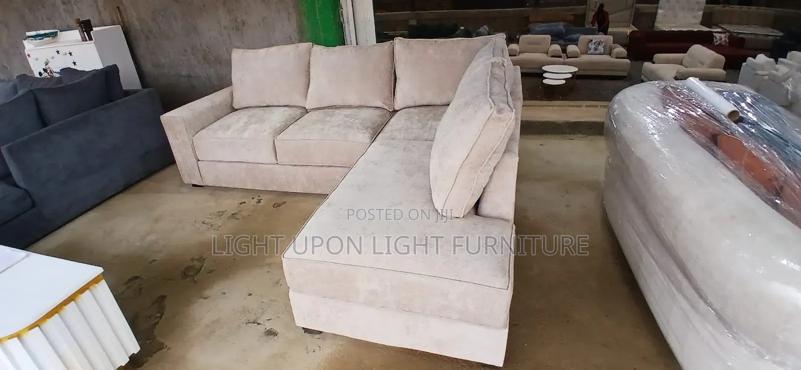 L Shaped Sofa With Back Pillows