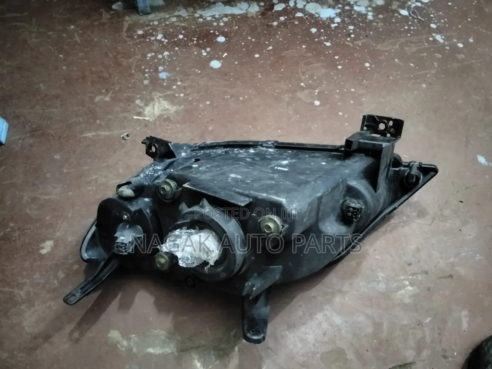 Mazda Demio 2002 Headlight