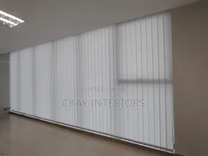Enjoy Flexible Light Control Throughout With White Vertical Blinds