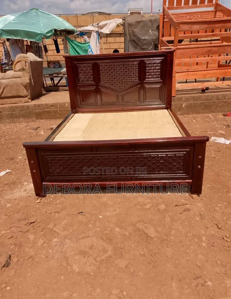 Dark Brown Wooden 5*6 Bed