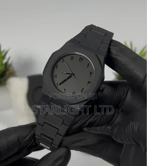 Modern All-Black Analog Watch With Eastern Arabic Numerals Dial