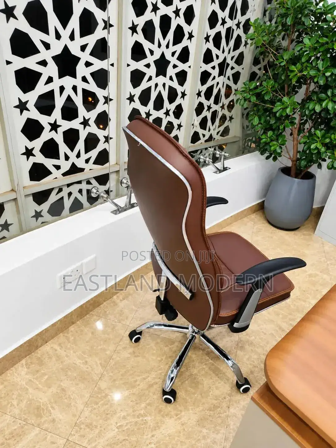 Brown High Back Leather Manager Chair With Padded Armrests