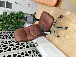 Brown High Back Leather Manager Chair With Padded Armrests