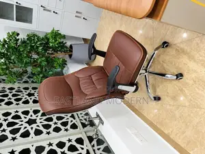 Brown High Back Leather Manager Chair With Padded Armrests