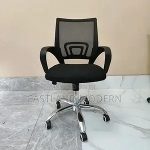 Ergonomic Mesh Office Chair With Adjustable Height Wheels.