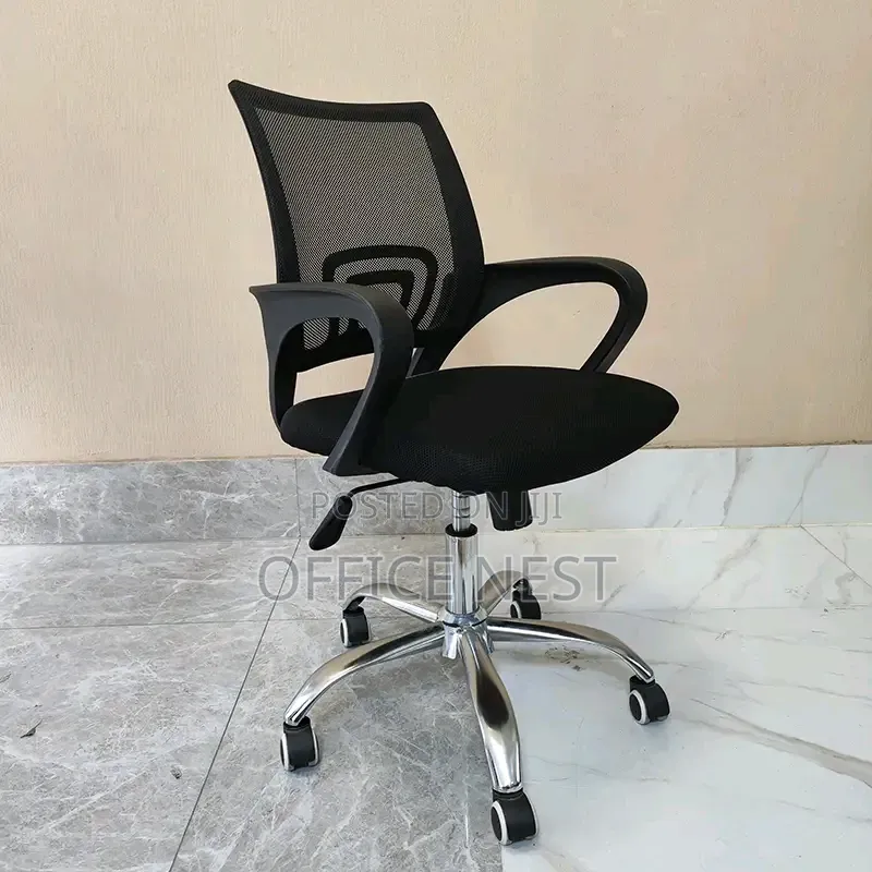 Ergonomic Mesh Office Chair With Adjustable Height Wheels.
