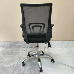 Ergonomic Mesh Office Chair With Adjustable Height Wheels.