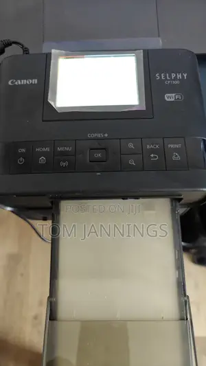 Like New Canon Selphy CP1300 Printer W/2 Batteries