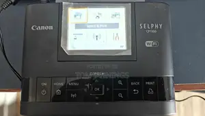 Like New Canon Selphy CP1300 Printer W/2 Batteries