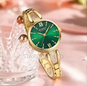 Luxury Gold Stainless Steel Quartz Wristwatch With Emerald Green Dial