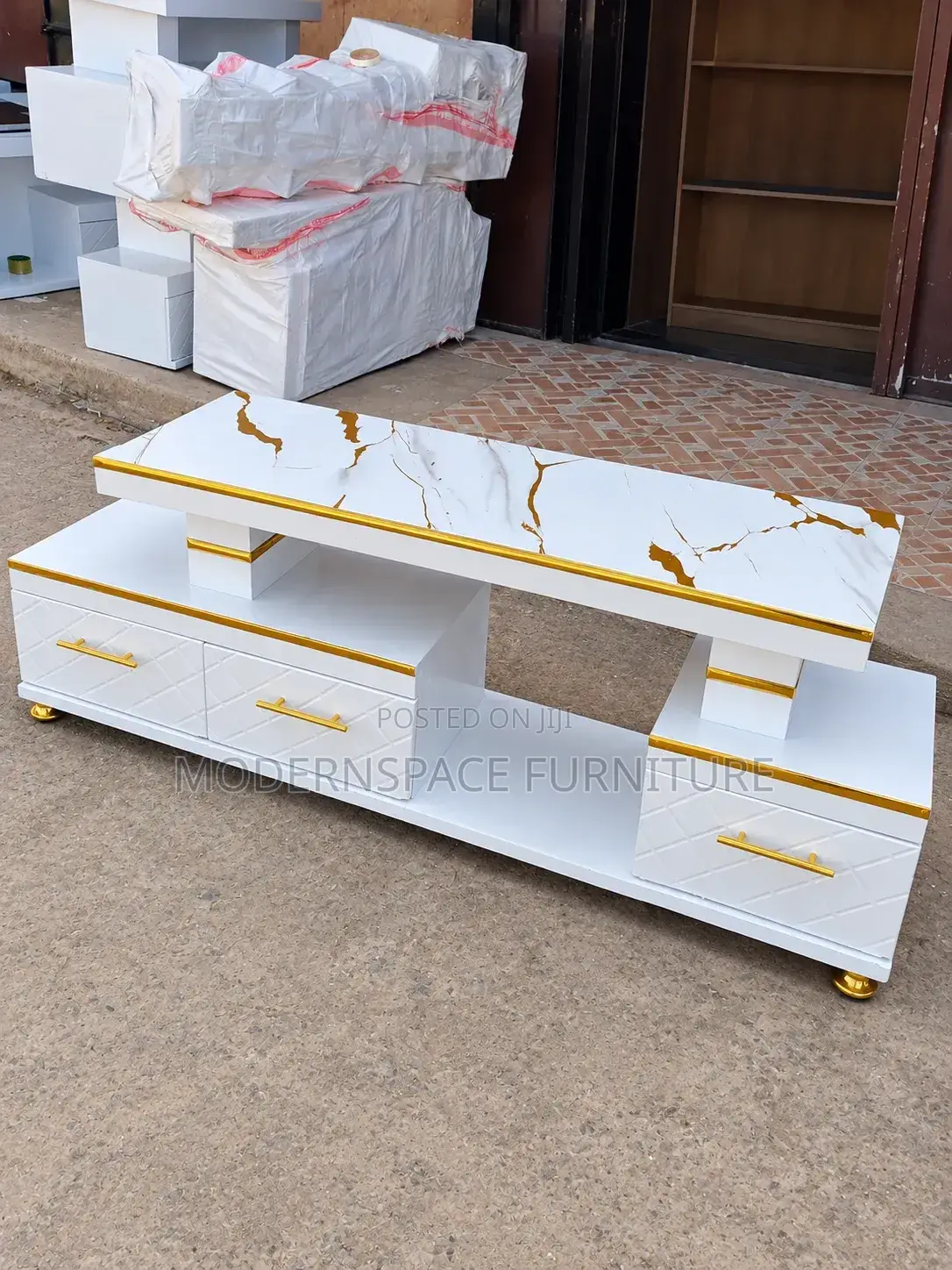 Stylish White TV Console With Gold Handles