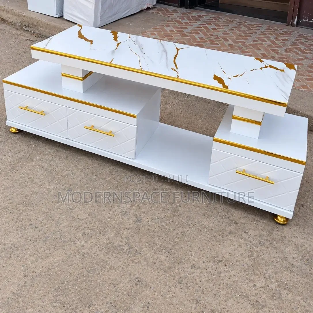 Stylish White TV Console With Gold Handles