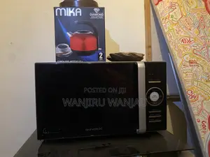 Von 3+1 Cooker (60x60) Daewoo Digital Microwave Combo – Moving Sale!