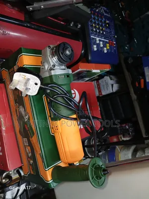 Green-and-Yellow Jadever 710W Angle Grinder