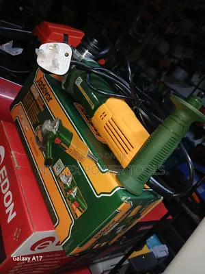 Green-and-Yellow Jadever 710W Angle Grinder