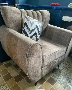 1-Seater Brown Armchair.