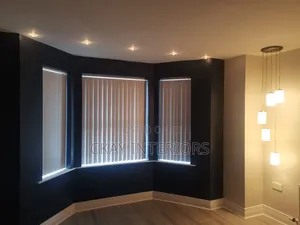 A Little Curtain Magic With Vertical Blinds