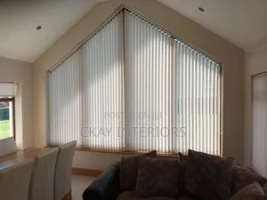 A Little Curtain Magic With Vertical Blinds