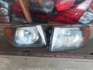 Pajero Io Headlight Orange Type Complete With Bulb