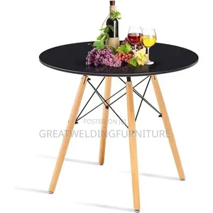 Elegant Round Dining Table With Wooden Legs