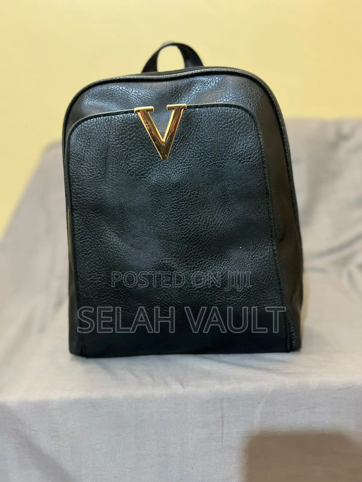 Black Leather Backpack With Gold Detail