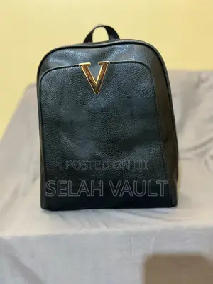 Black Leather Backpack With Gold Detail