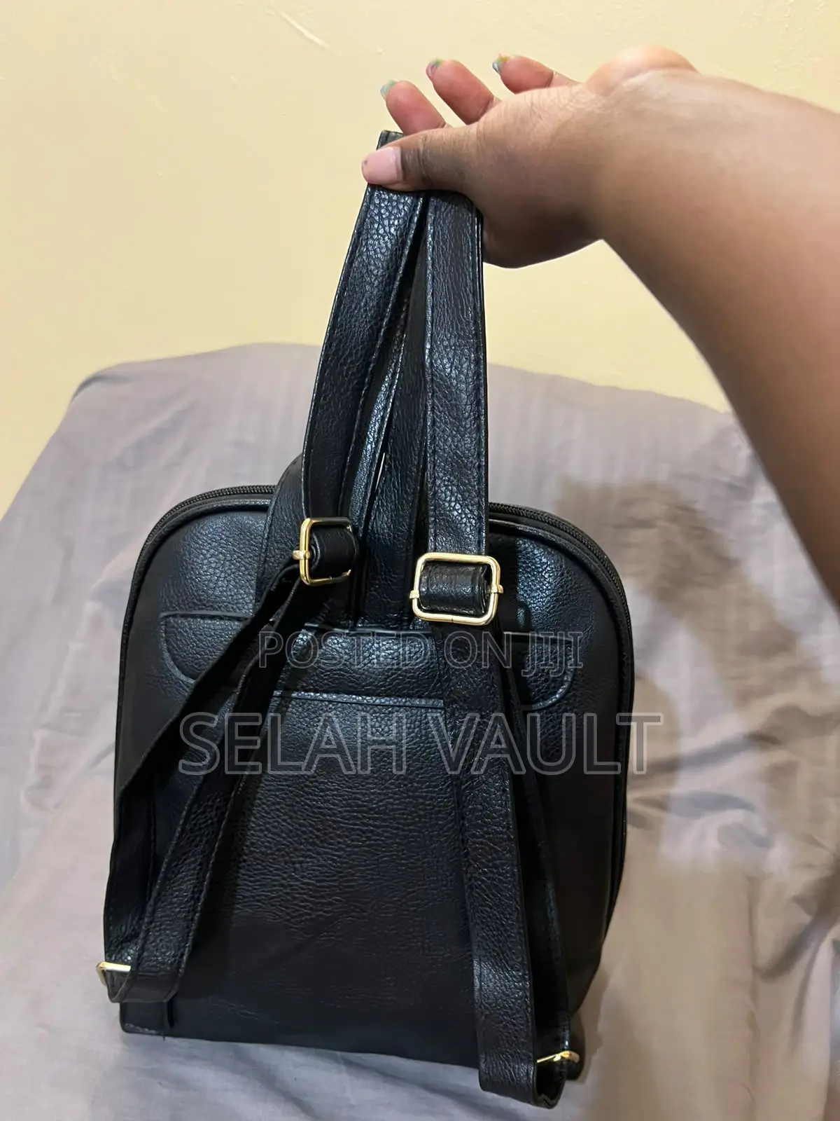Black Leather Backpack With Gold Detail