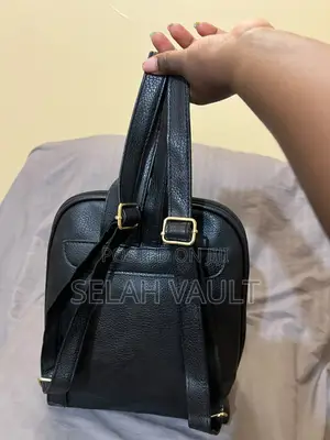 Black Leather Backpack With Gold Detail