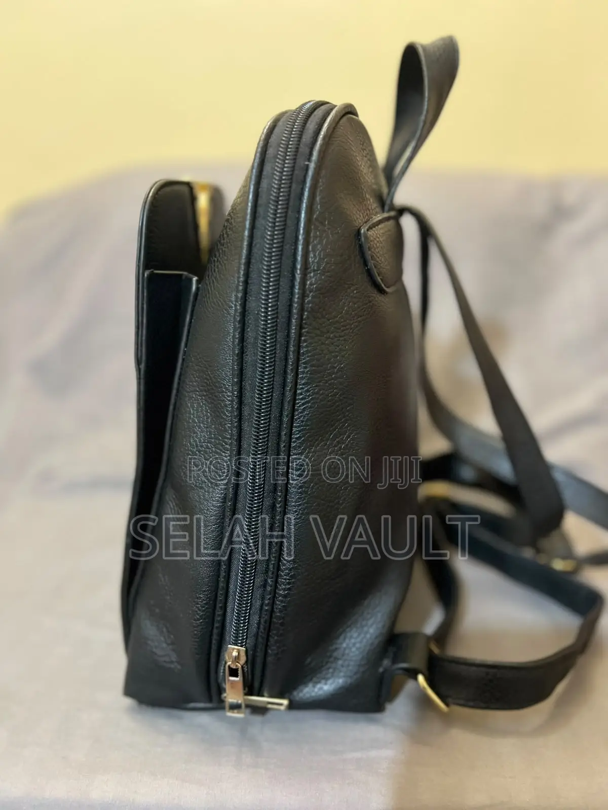 Black Leather Backpack With Gold Detail