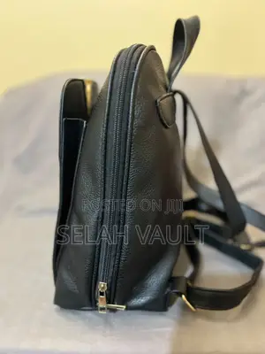 Black Leather Backpack With Gold Detail