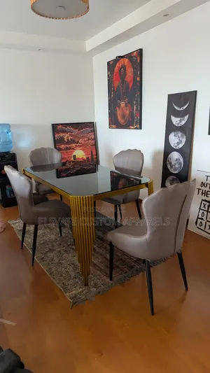 4 Seaters Glass Top Dining Table With a Gold Metal Frame/Legs