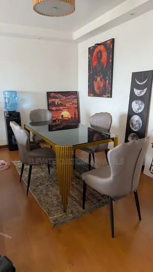 4 Seaters Glass Top Dining Table With a Gold Metal Frame/Legs