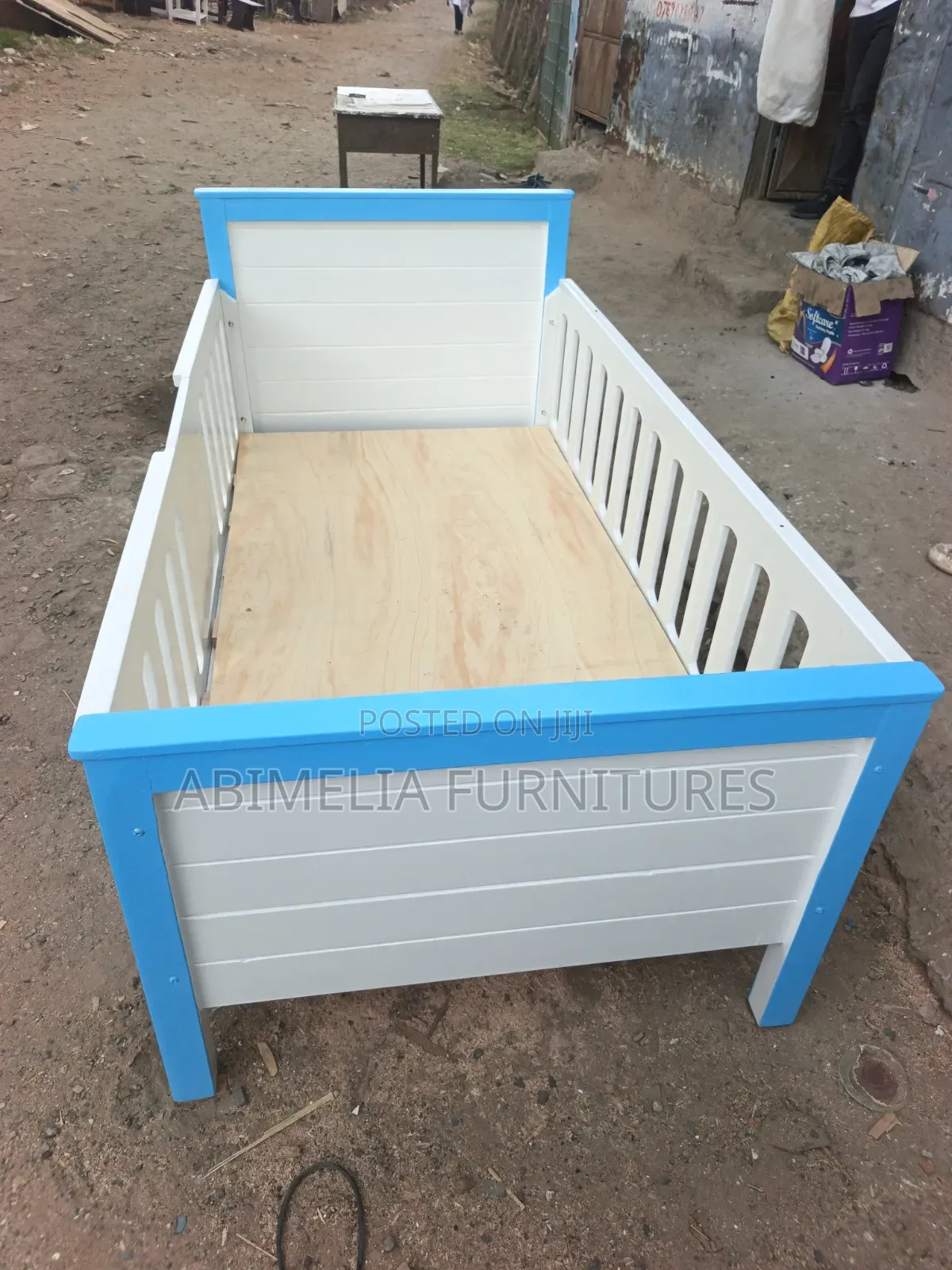 White and Blue Toddler Bed