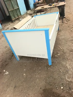 White and Blue Toddler Bed