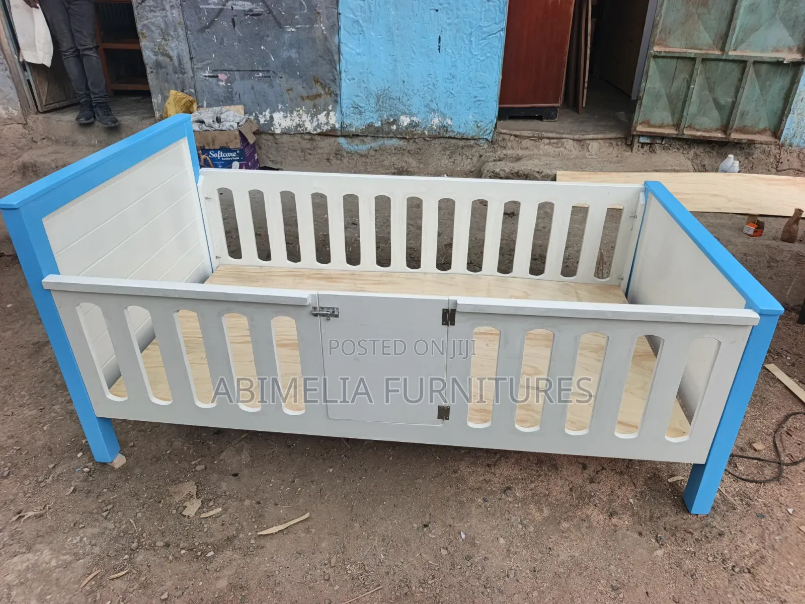 White and Blue Toddler Bed
